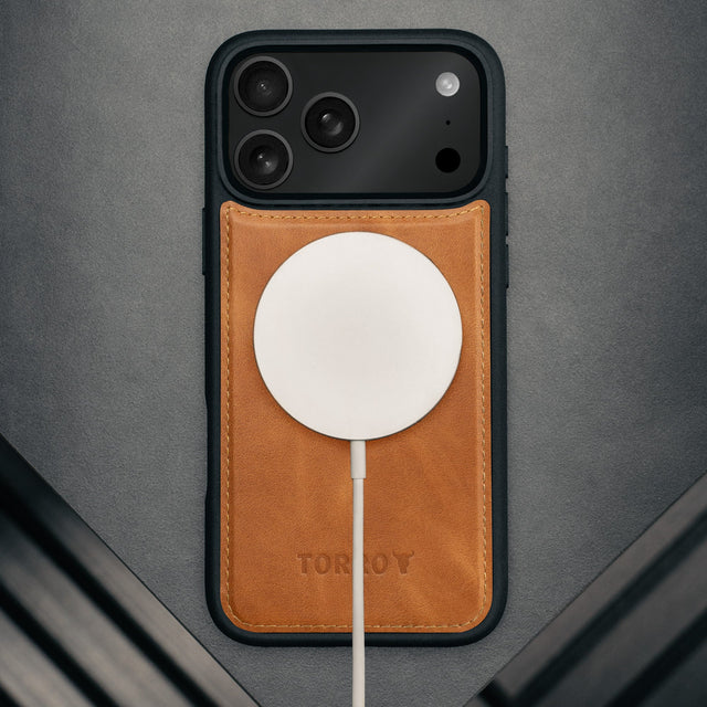 MagSafe charger attached to the Nubuck Dark Brown Detachable Case for iPhone 17 Pro Max