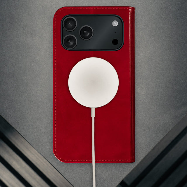 MagSafe charger attached to the Red Leather Case for iPhone 17 Pro Max