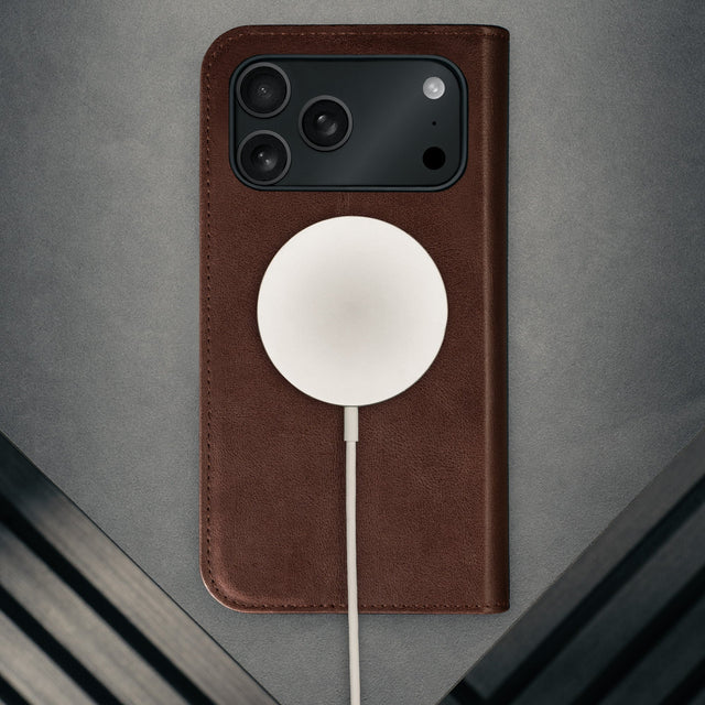 MagSafe charger attached to the Dark Brown Leather Case for iPhone 17 Pro Max