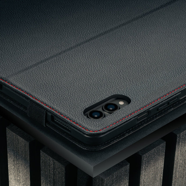 Camera cutout on the Black with Red Detail Leather Case for Galaxy Tab S11 Ultra