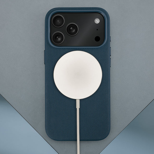 Wireless charger attached to the Blue Woven Fabric Bumper Case for iPhone 17 Pro Max