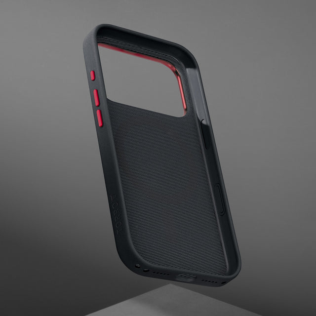 Metallic buttons and inside of the Black with Red Detail Woven Texture Bumper Case for iPhone 17 Pro