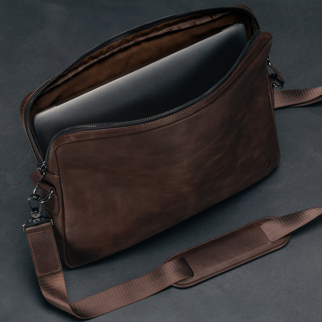 Inner protective flap in the Dark Brown Leather Messenger Bag