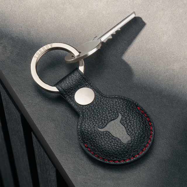 Black with Red Detail Leather Apple AirTag Holder Keyring attached to key