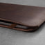 Elastic straps in the Dark Brown Leather iPad Sleeve to securely hold your iPad