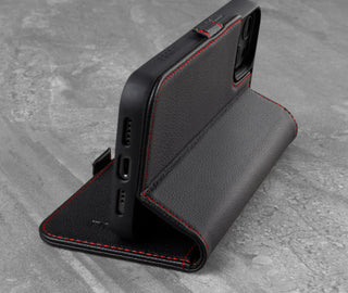 Integrated stand function of the Black Leather (with Red Stitching) Folio Case for iPhone 13